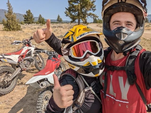 Derek out on the trail with a riding buddy