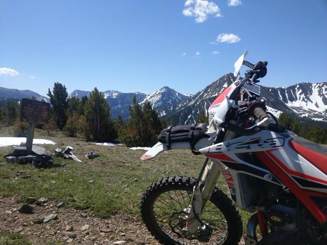 A rider taking in the view from a mountain trail