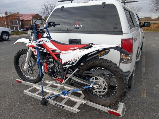 Motorcycle loaded in a truck, ready to sell with full service history