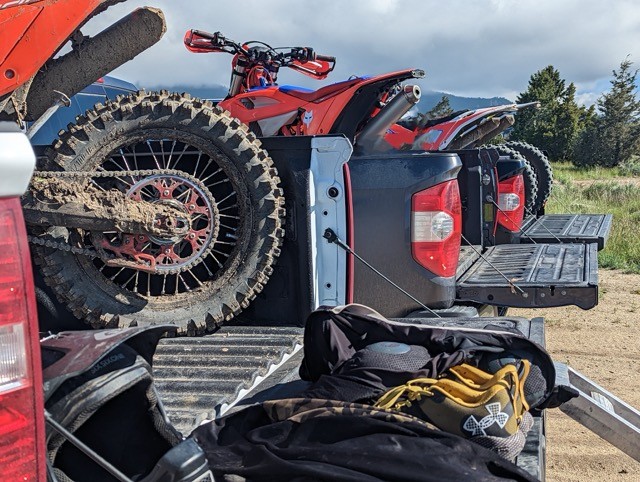 Dirt bikes loaded in truck bed ready for adventure